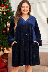 Navy blue dress with V -neck and large textured velvet buttons