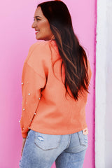 Sweatshirt with pearl sleeves and drooping shoulders, round neck