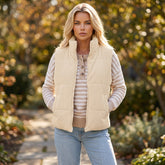 Gilet matelassé beige en velours côtelé à col montant, zippé