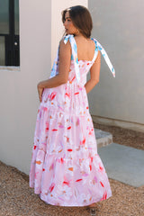 Robe longue smockée rose à imprimé floral et épaules nouées