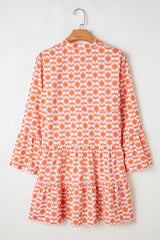 Orange mini-shelter with floral print and ruffle sleeves *