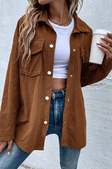Textured brown jacket with flap pockets and drooping shoulders