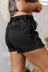 Short en jean noir à taille élastique et poches