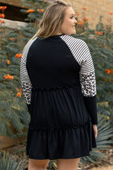 Striped black dress with ruffles and large leopard patch patch sleeves