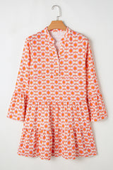Orange mini-shelter with floral print and ruffle sleeves *