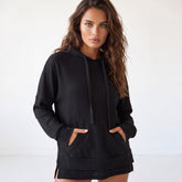 Sweat à capuche noir oversize en maille gaufrée, doublé polaire