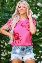 Short -sleeved knitting top embroidered with bright pink flowers