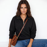 Sudadera negra con cuello semi-fermited texturizado