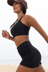 Black crossed bikini swimsuit and short skirt *