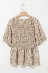 Smocked top with puffy sleeves and floral print