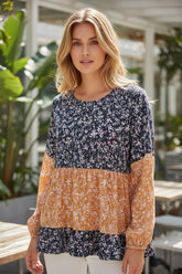 Blusa de flores y bloques de color *