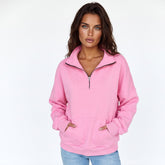 Sweat-shirt rose bonbon à col montant zippé et poche kangourou