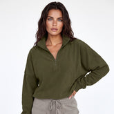 Sudadera de cuello con cremallera y hombros caídos de la jungla verde