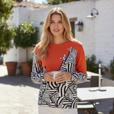 🦓 Pull imprimé zèbre orange et noir