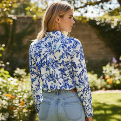 Elegant blouse with notched collar and floral sky blue *