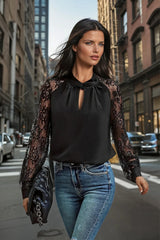 Black blouse with raglan sleeves in floral lace *