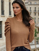 High textured with buttoned leg sleeves *