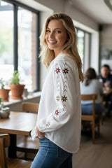 White shirt in patchwork with eyelets and puffy sleeves *