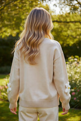 Elegante cárdigan abotonado en la parte delantera con pergamino de decoración floral