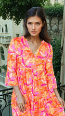 Orange dress with abstract print *