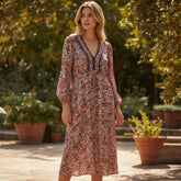 Midi dress with floral print split on the front *