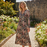 Vestido negro largo con estampado floral y en v -cuello, cintura alta