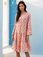 Orange mini-shelter with floral print and ruffle sleeves *