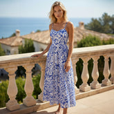 Robe longue taille haute à bretelles spaghetti et imprimé floral bleu ciel