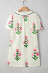 Mini-robe ample à manches courtes et col fendu, motif floral abricot