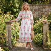 Robe longue blanche à imprimé floral, col mandarin et manches 3/4