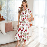 Robe longue beige à volants et manches courtes bouffantes à fleurs