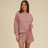 High with long sleeves and textured shorts for Blossom tiles