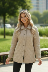 Veste matelassée boutonnée de couleur unie