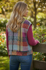 A large zipped vest with multicolored Scottish print with side pockets