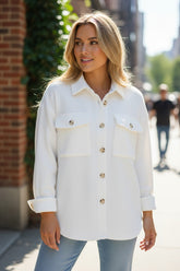 Long sleeve jacket buttoned in chopped velvet of white color