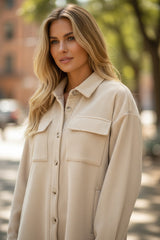 Chaqueta de manga larga en albaricoque abotonado de terciopelo de color liso