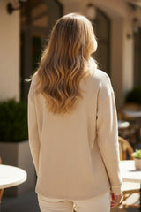 Chaqueta de manga larga en albaricoque abotonado de terciopelo de color liso