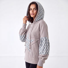 Sudadera con capucha con cordón de apriete y mosaico floral Hermosa azul