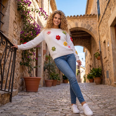 Pull blanc en maille texturée à fleurs colorées en applique
