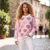 Pull rose duveteux à cœurs léopard et détails perlés