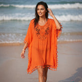 La robe plage bohème orange qui illumine chaque silhouette