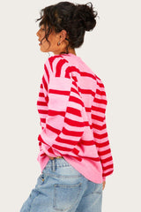 Pink striped sweater and bubble sleeves, drooping shoulders, ribbed border