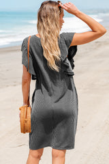 Mini-robe texturée noire à manches flottantes et à volants