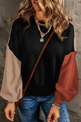 Black sweater with ribbed edge and COLOR BLOCK bishop sleeves