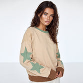 Sudadera de gran tamaño con seduits aparentes y respaldo de estrellas de mosaico