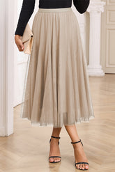 Jupe midi abricot évasée en tulle superposé avec doublure