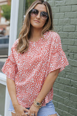 Pink t-shirt with fluffed sleeves and leopard polka dots