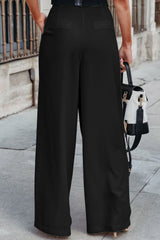 Pantalones elegantes plisados negros