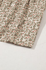 Smocked top with puffy sleeves and floral print