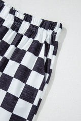 Grandes pantalones de cintura alta negras con baldosas de dos colores *
